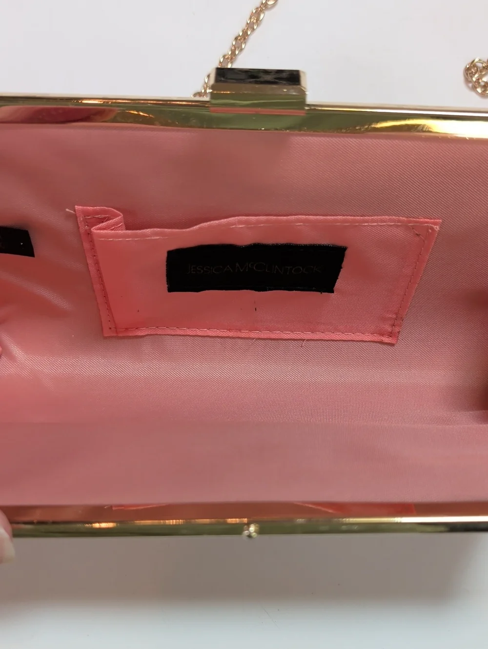 Jessica McClintock, Salmon Color Laser Cut Filigree Purse With Gold Background